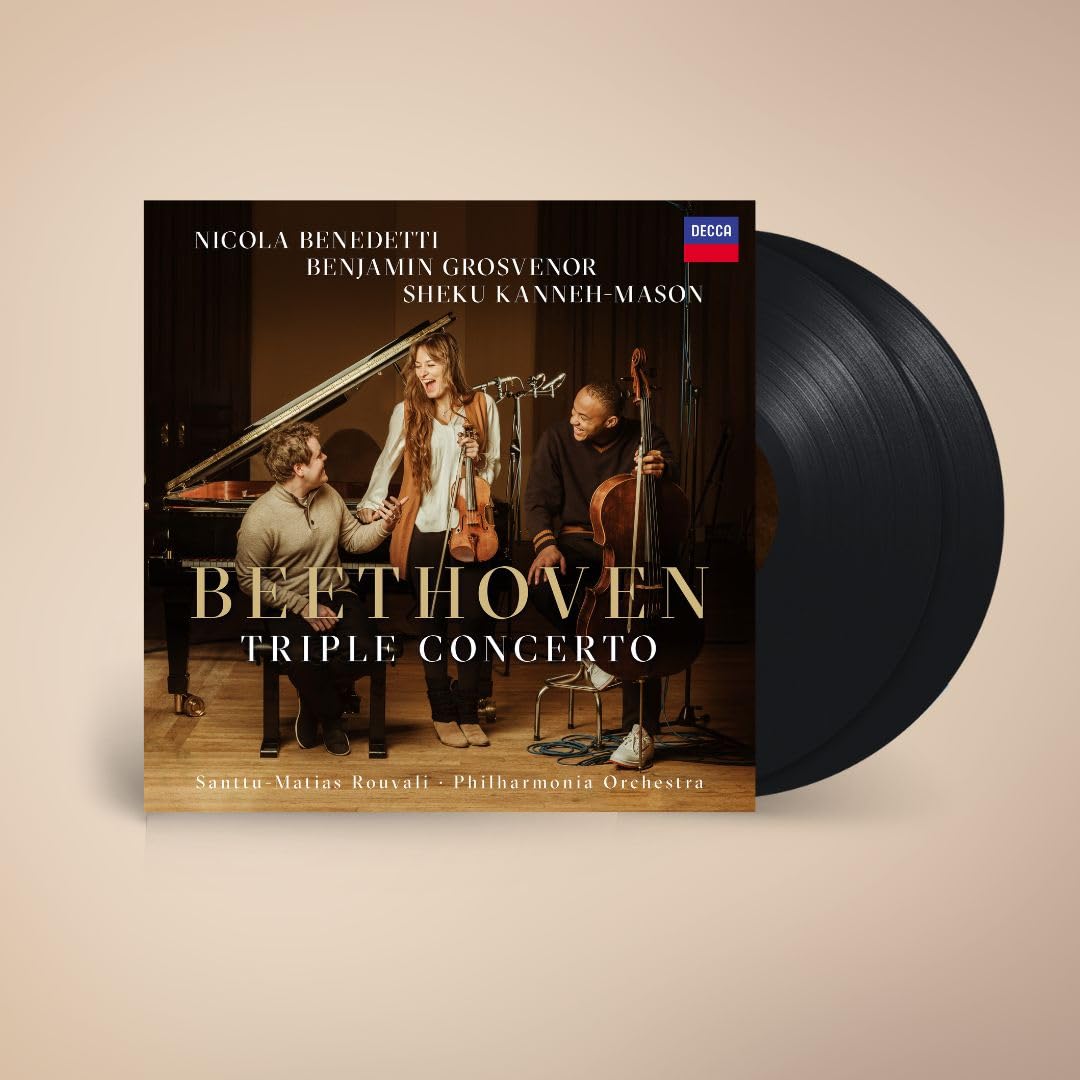 Vinyl record cover featuring three musicians and a piano in gold tones.