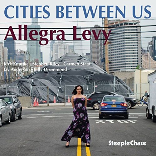 CD cover for Allegra Levy’s “Cities Between Us” featuring a city street scene.