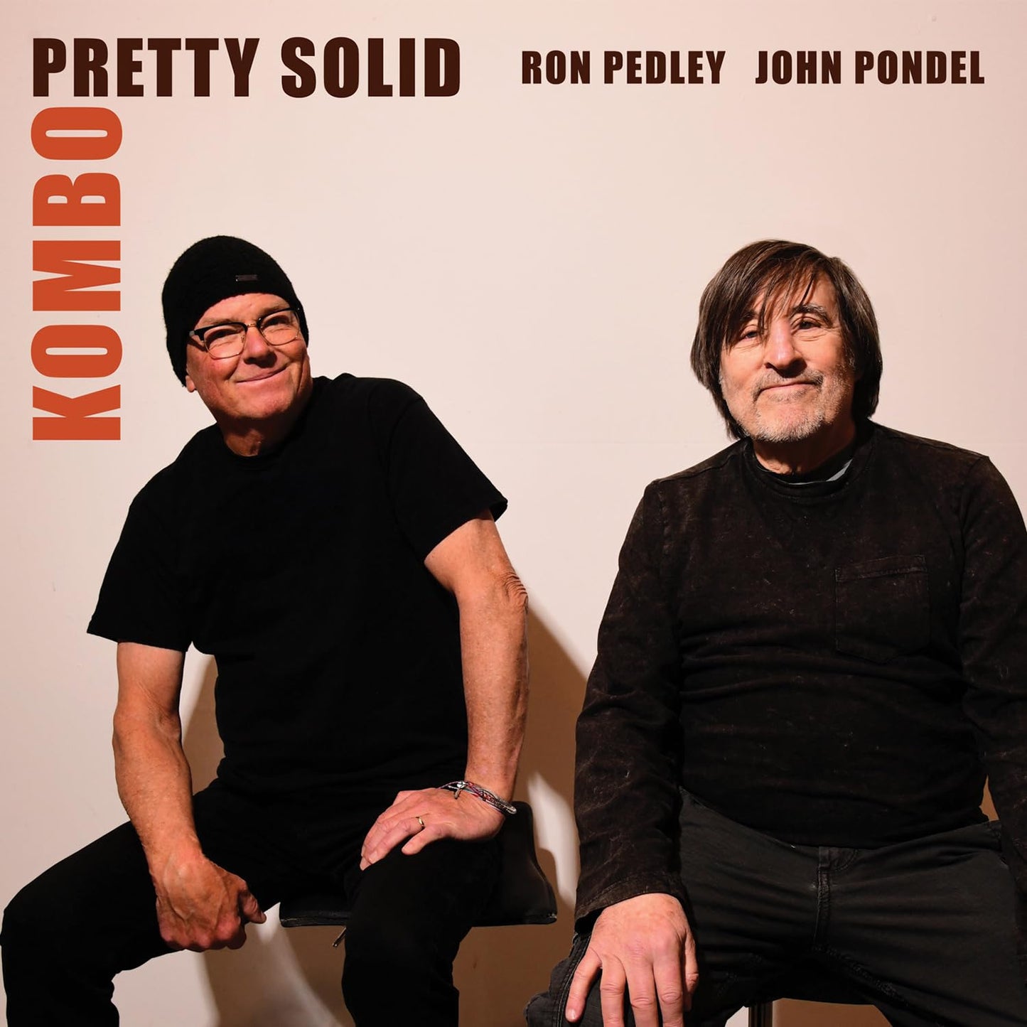 CD cover featuring two men and the text "KOMBO - Pretty Solid".