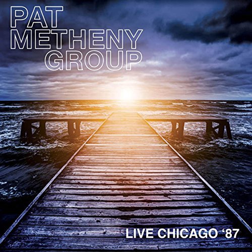 CD cover: wooden pier receding toward a bright sun over water.