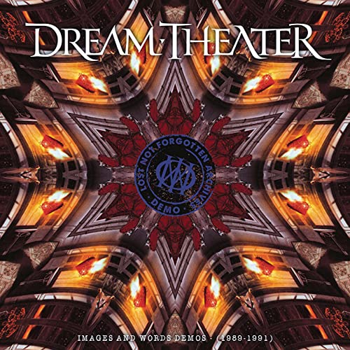 Dream Theater album cover: symmetrical, ornate design with central blue emblem.