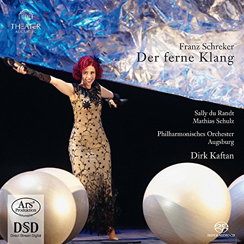 CD cover: singer in ornate dress, stage with large white spheres.