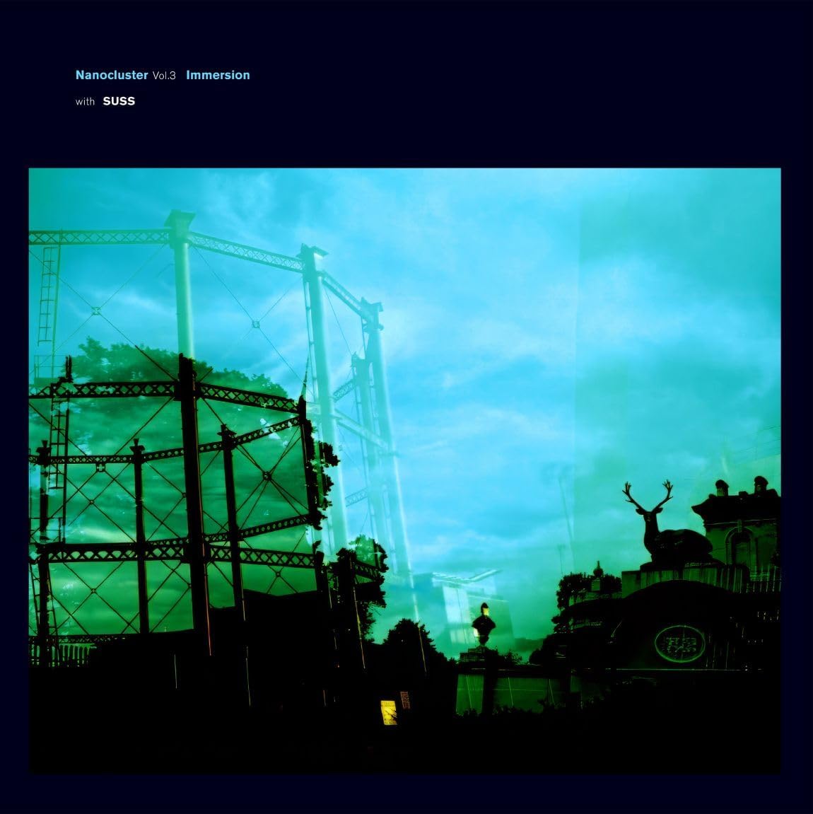 Dark silhouette of a gas tower and deer against a teal, hazy background.