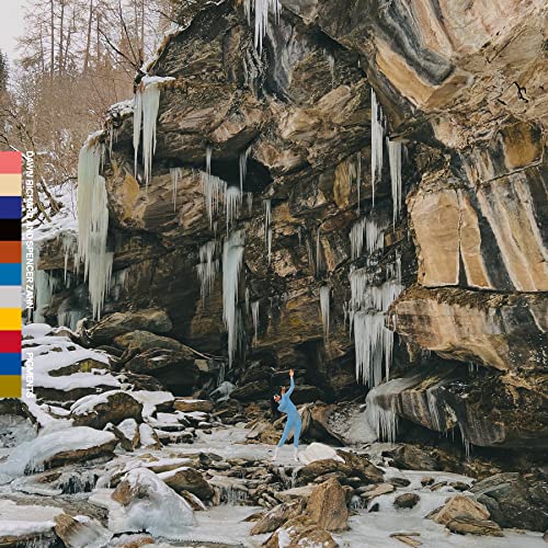 Album cover: icy cliffside with a small figure reaching upwards.