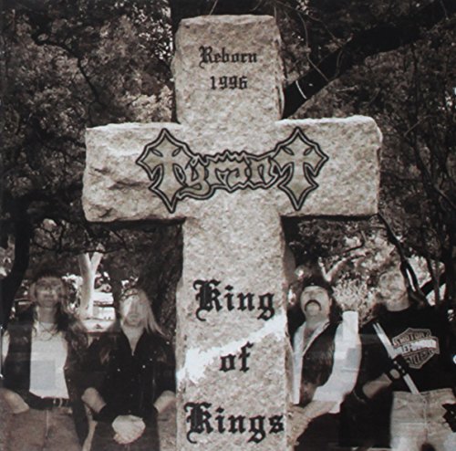 Stone cross with band name "Tyrant" and four figures below.