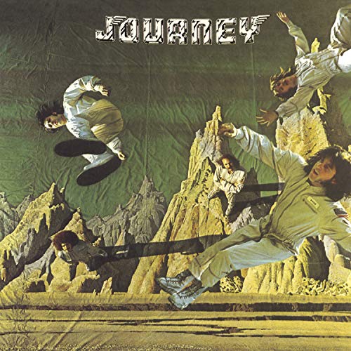 Album cover for Journey, featuring band members in a mountainous landscape.