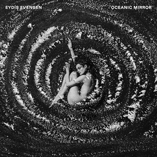 Album cover: woman embracing herself within swirling, textured grayscale waves.