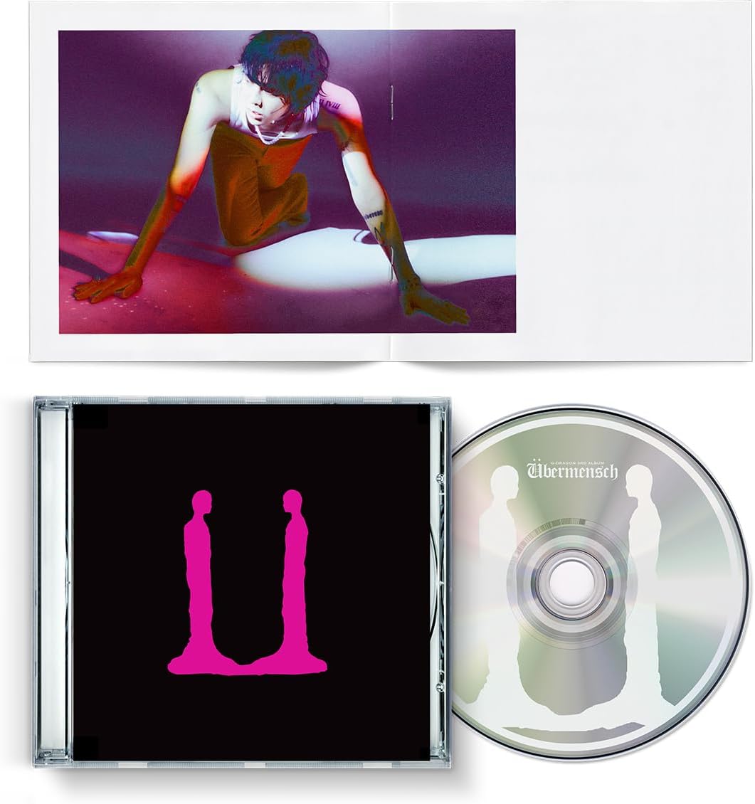 G-DRAGON “UBERMENSCH” CD case with artist portrait and disc image.