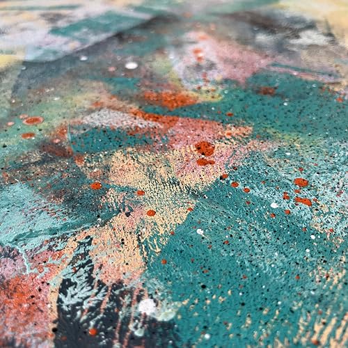 Abstract vinyl record cover with teal, orange, and speckled paint.