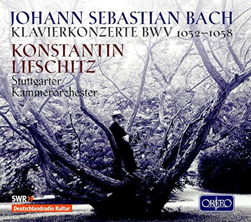 CD cover: pianist in tree branches, text naming Bach concertos and artists.
