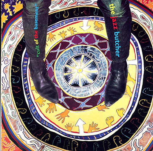 Album cover: legs, colorful spiral design, and band name "The Jazz Butcher".