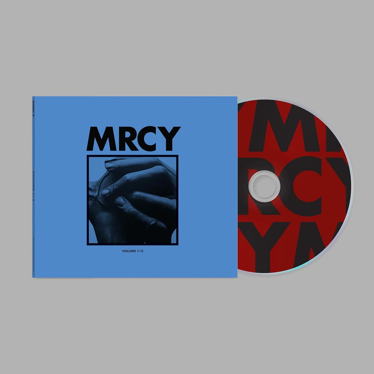 Mrcy - Volume 2" CD cover with hands and red circle design.