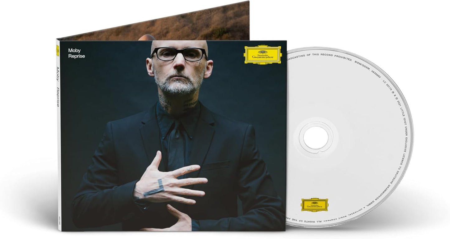 CD case for Moby’s “Reprise” album featuring a portrait of the artist.