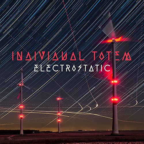 CD cover: Wind turbines and star trails against a dark night sky.