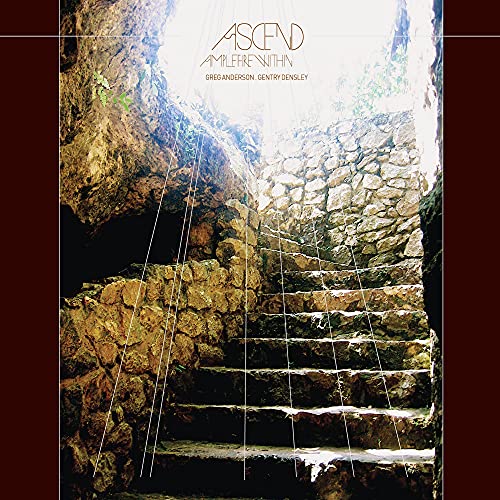 CD cover with a stone staircase leading upwards into bright light.