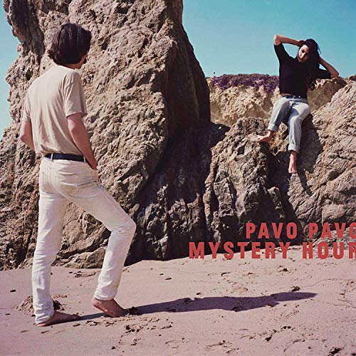 CD cover: two people on rocks with desert landscape and album title.