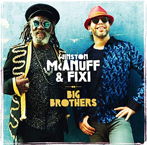 Two men, Winston Mcanuff and Fixi, with album title overlay.
