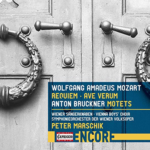 CD cover featuring ornate doors and text listing Mozart and Bruckner compositions.