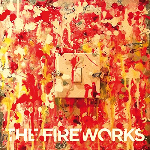 Abstract red and yellow paint splatters with a light switch detail.