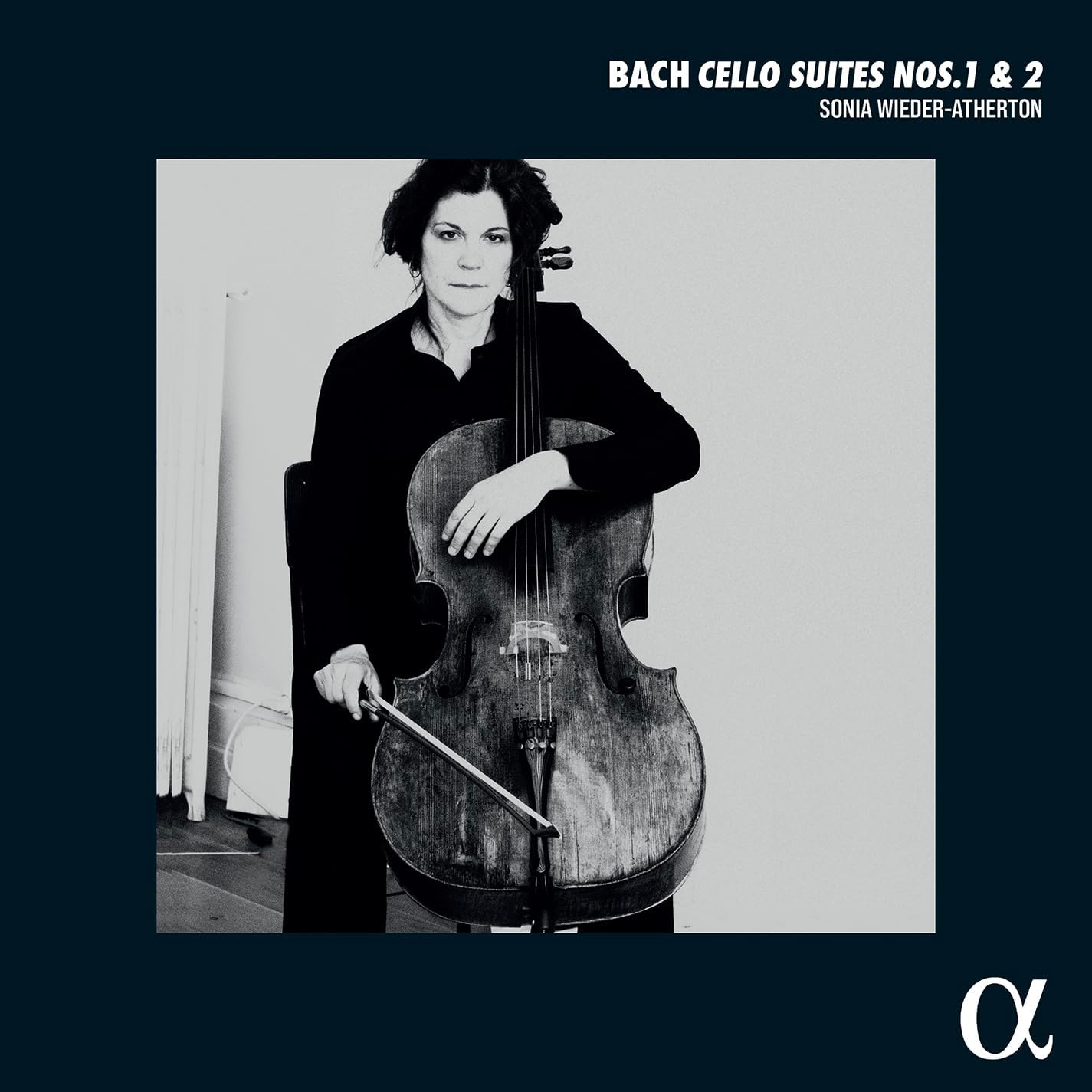 Black and white portrait of cellist Sonia Wieder-Atherton with her instrument.