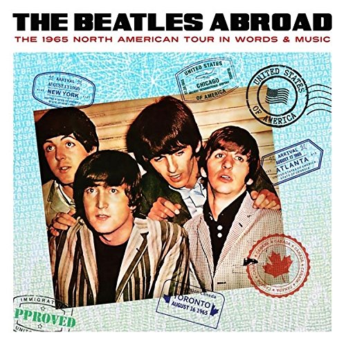 The Beatles album cover featuring the band with travel stamps and text.