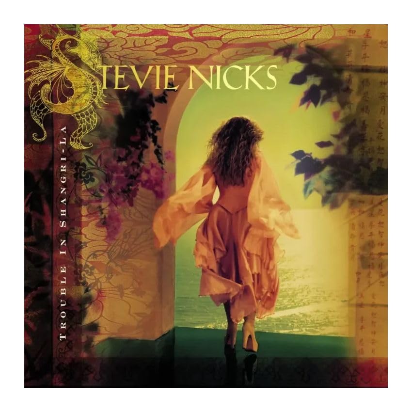 Album cover for Stevie Nicks’ “Trouble In Shangri-La” featuring a woman walking away.