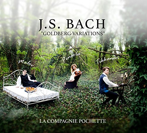 CD cover: Musicians in a forest setting with a white iron bed.