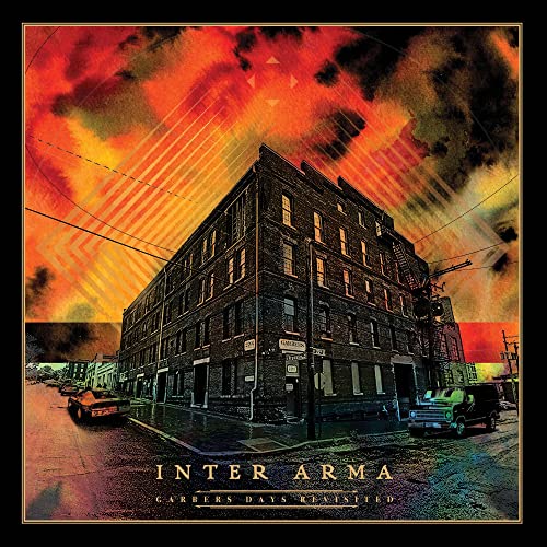 Album cover: brick building with orange and red abstract sky.