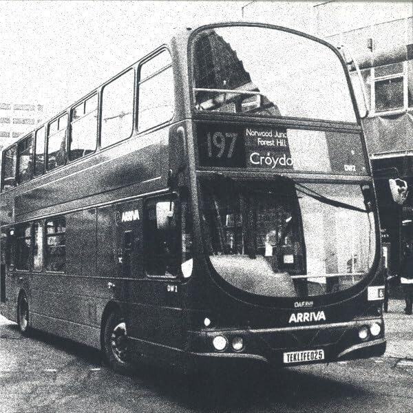 Black and white photo of a double-decker London bus with route number 197.