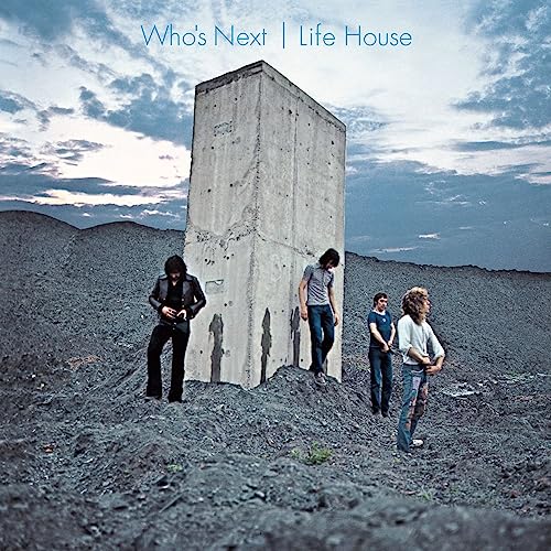 Album cover: The Who’s “Who’s Next” featuring four figures near concrete pillar.