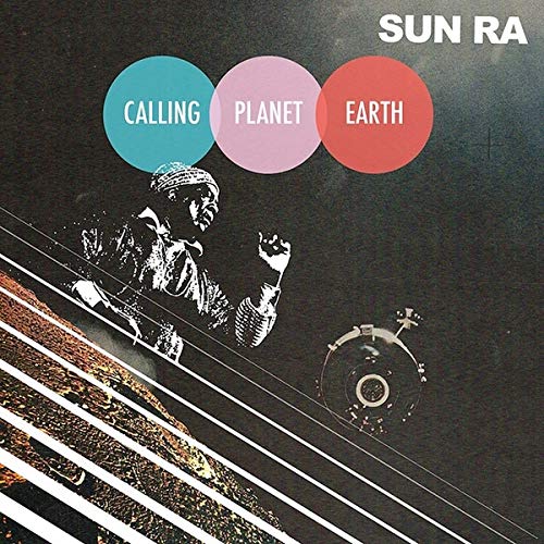 Sun Ra album cover with colorful circles and a silhouetted musician.