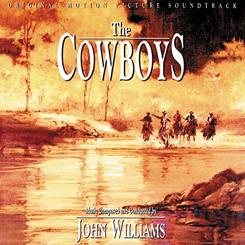 The Cowboys" vinyl record cover with cowboys on horseback in a landscape.