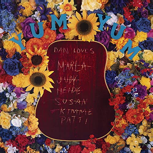 CD cover with floral background and guitar shape with handwritten names.