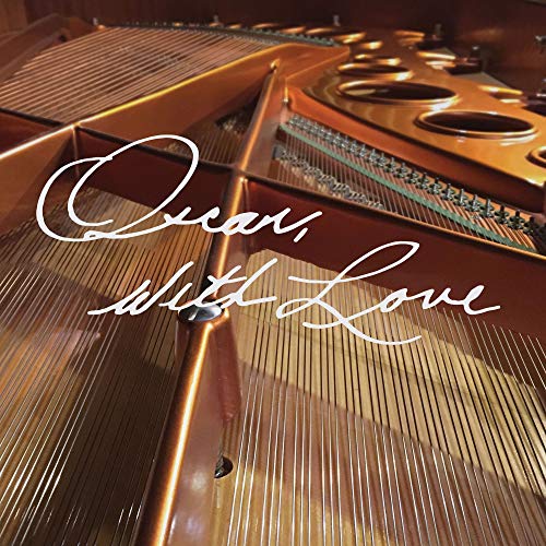 CD cover featuring a close-up of piano strings and the title "Oscar, With Love.