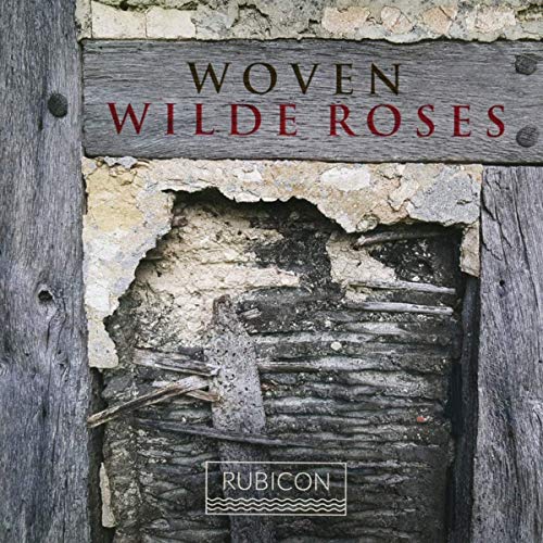 CD cover with weathered stone wall, red text "Woven Wilde Roses".