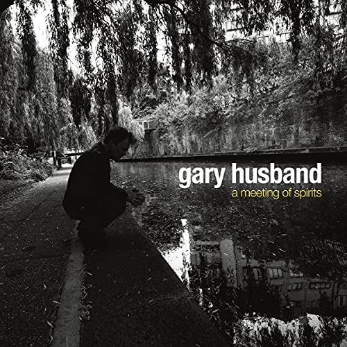 Black and white album cover featuring a man by a waterway.