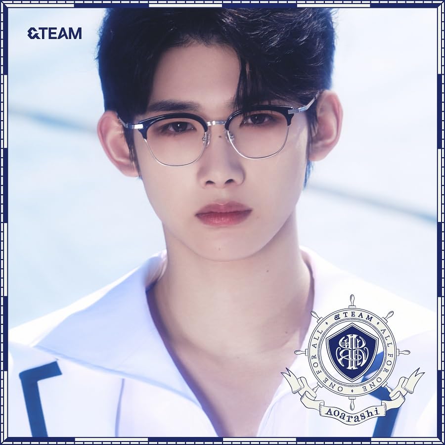 &TEAM album cover featuring a close-up portrait of a young man with glasses.
