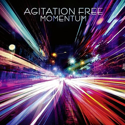 CD cover for “Momentum” by Agitation Free, with blurred, colorful light streaks.