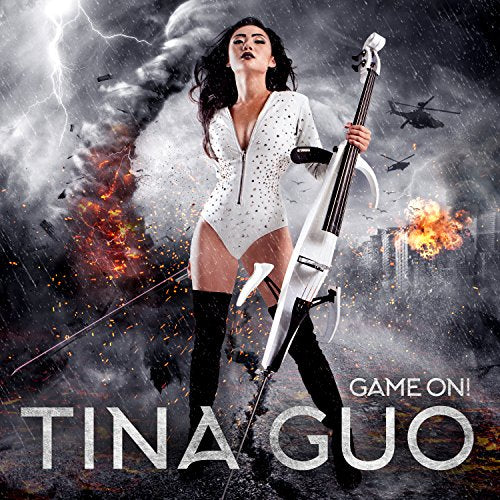Tina Guo holds a white electric cello amidst a stormy, explosive background.