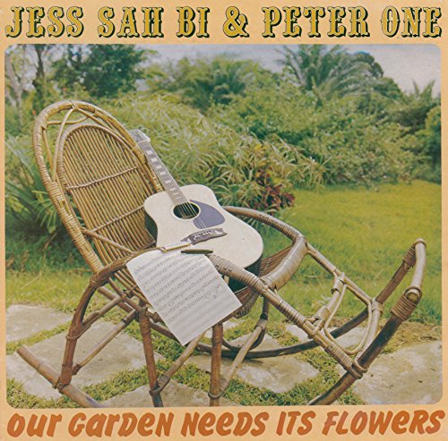 CD cover: wicker chair with guitar and sheet music in a garden.