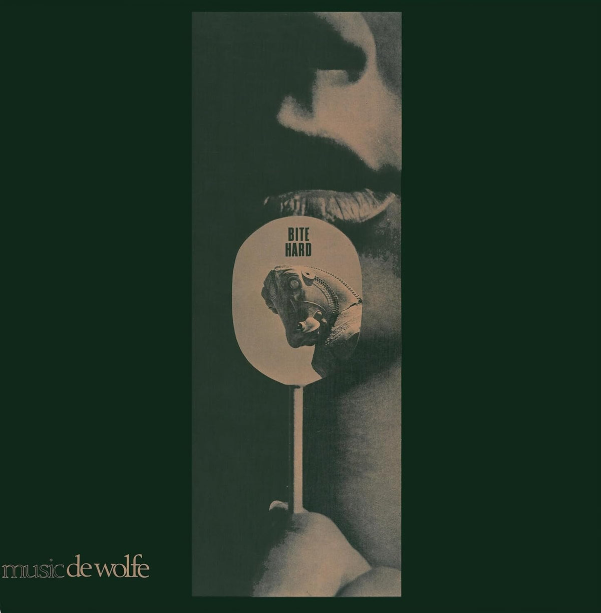 Dark album cover with a distorted face and the text "BITE HARD".