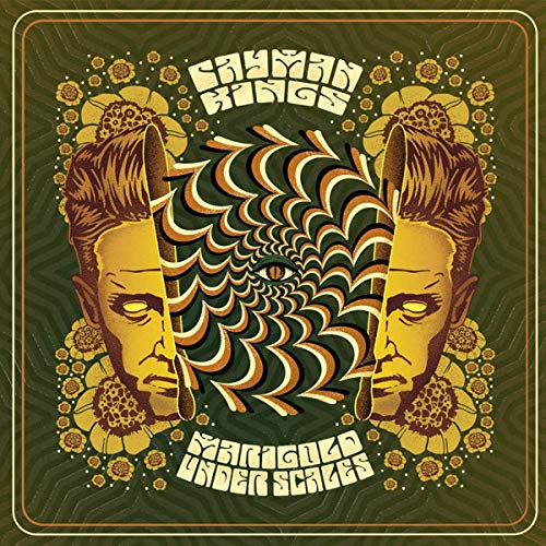 Album cover for Cayman Kings’ “Marigold Under Scales” with illustrated faces and eyes.