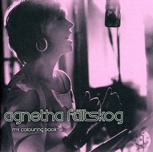 Agnetha Fältskog singing into a microphone, album cover for “My Colouring Book”.