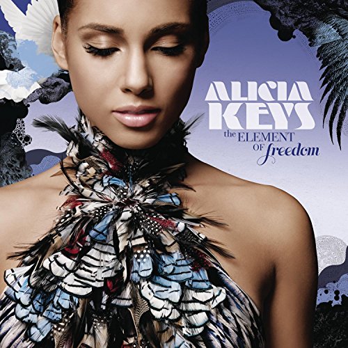 Alicia Keys wearing a feathered collar on the cover of The Element of Freedom.