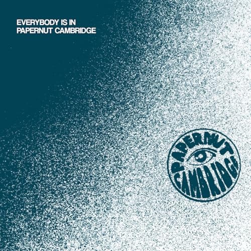 CD cover with speckled blue background and an eye within a circle.