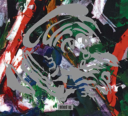 The Cure's "Mixed Up" vinyl album cover with abstract painted design.