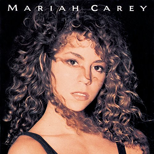 Mariah Carey album cover, close-up portrait with curly hair.