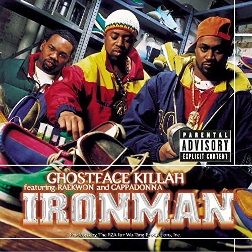 Ghostface Killah, Raekwon, and Cappadonna posing in front of shelves of sneakers.