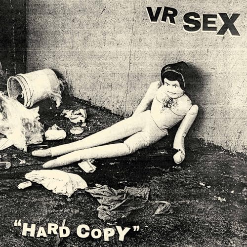 Black and white image of a discarded doll lying in dirt with text.