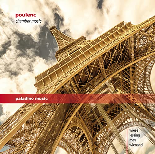 CD cover featuring a low-angle view of the Eiffel Tower against a cloudy sky.
